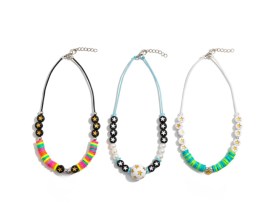 Cuentas plasticas pastilla blanca estrella dorada